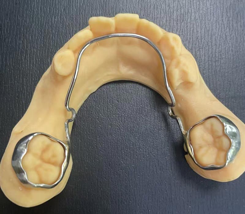 Coimeádán Áirse Teanga Mandibular